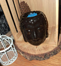 Brûleur de cire Bouddha noir mat pour décoration moderne et zen.